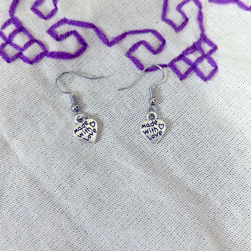 Silver home made “made with love” earrings, one size fits all.
